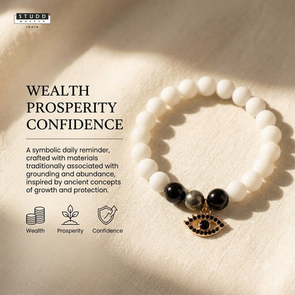 Richie Rich White Bead Black Evil Eye Charm Bracelet