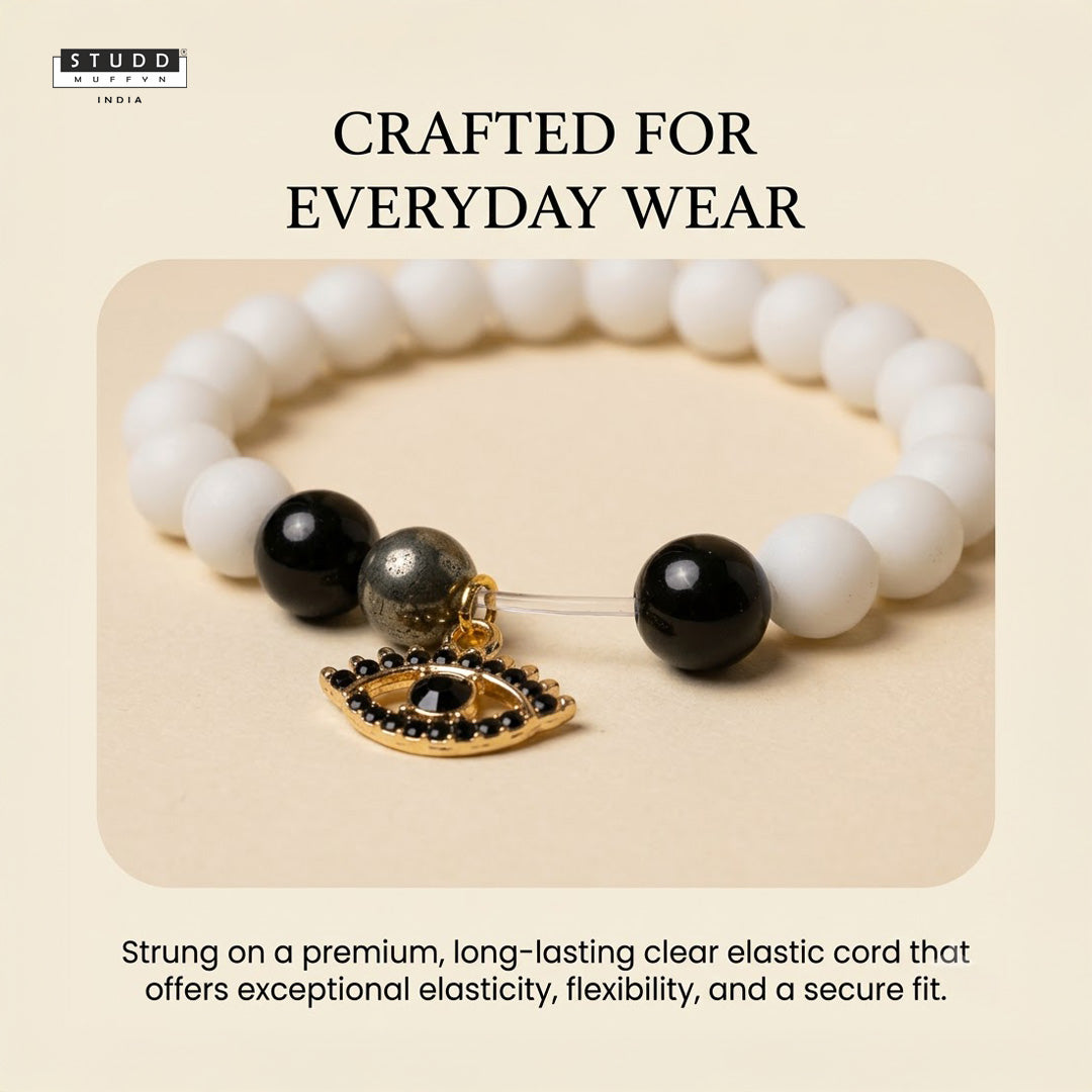 Richie Rich White Bead Black Evil Eye Charm Bracelet