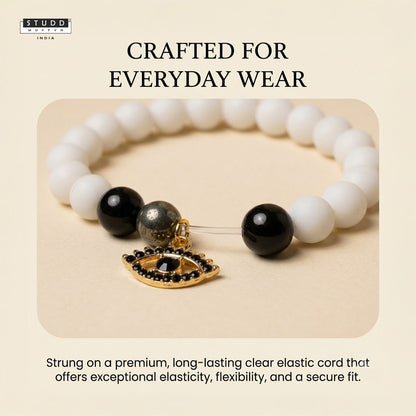 Richie Rich White Bead Black Evil Eye Charm Bracelet