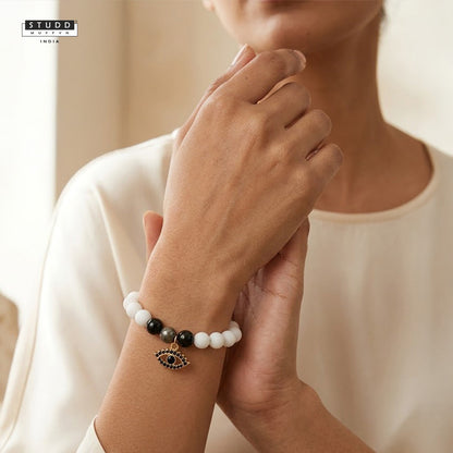 Richie Rich White Bead Black Evil Eye Charm Bracelet