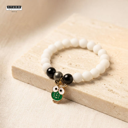 Richie Rich White Bead Green Owl Charm Bracelet