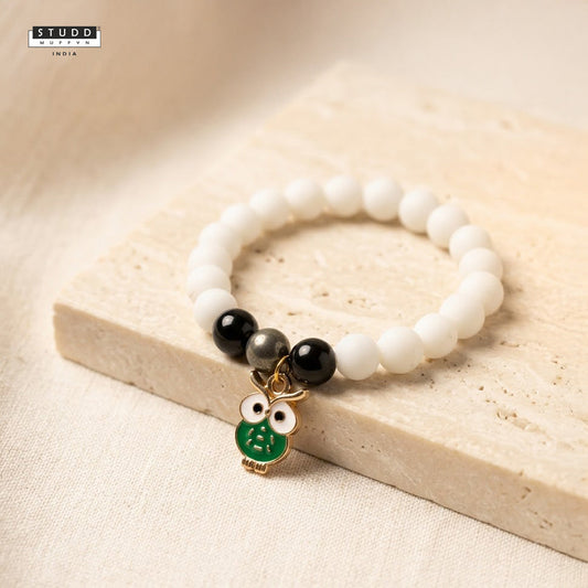 Richie Rich White Bead Green Owl Charm Bracelet