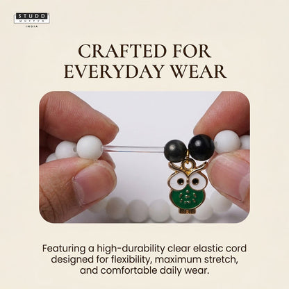 Richie Rich White Bead Green Owl Charm Bracelet
