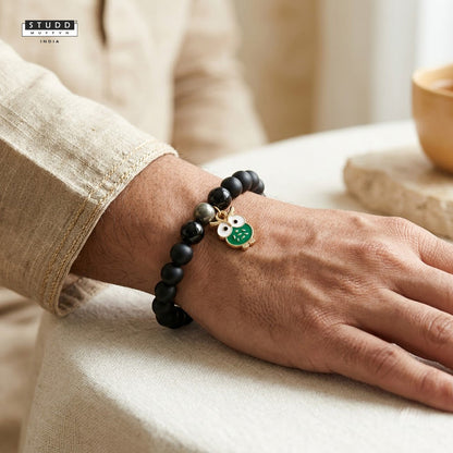 Richie Rich Black Bead Green Owl Charm Bracelet