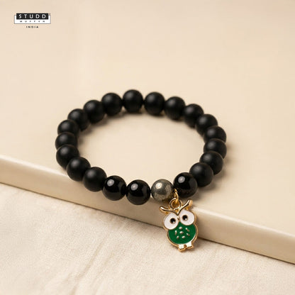 Richie Rich Black Bead Green Owl Charm Bracelet