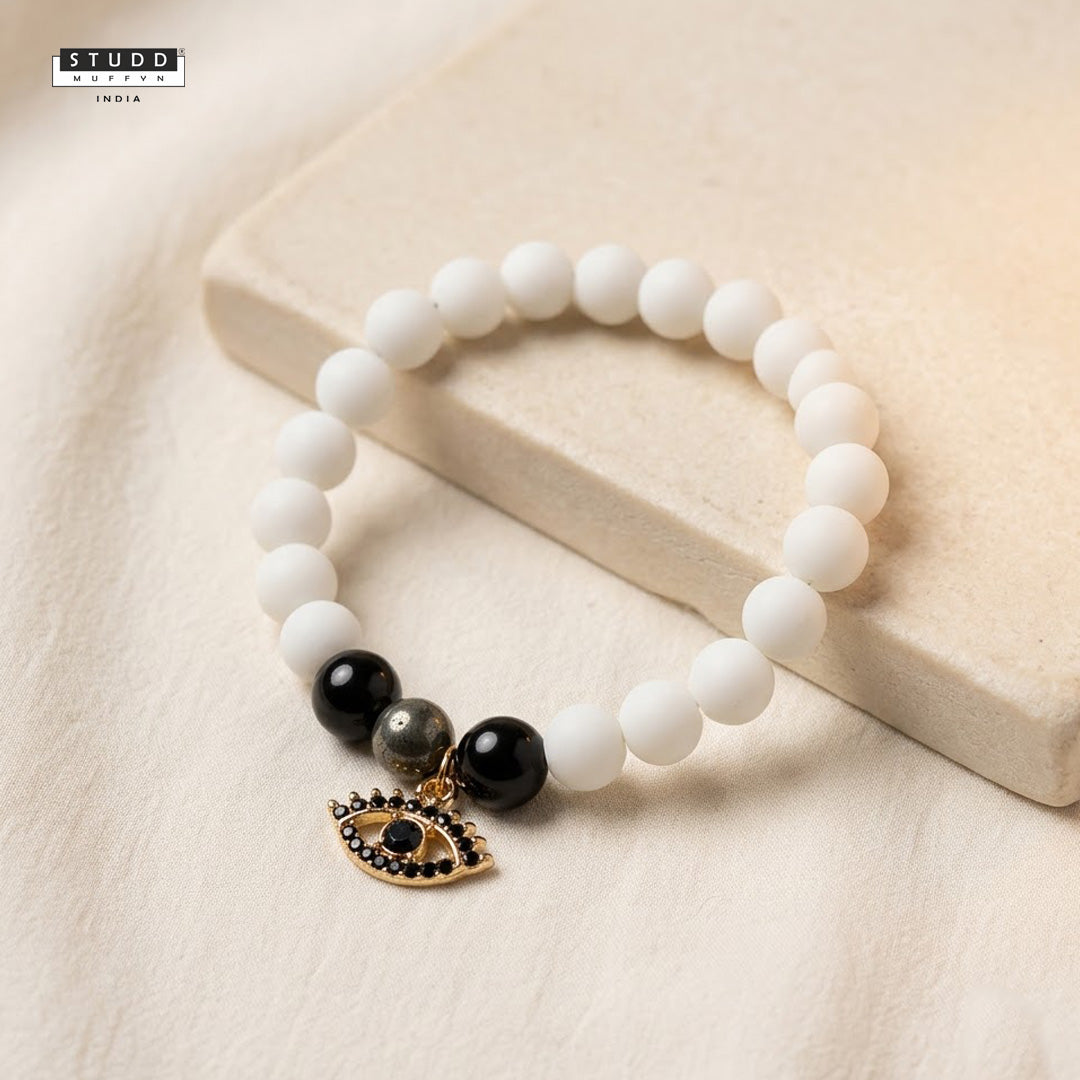 Richie Rich White Bead Black Evil Eye Charm Bracelet