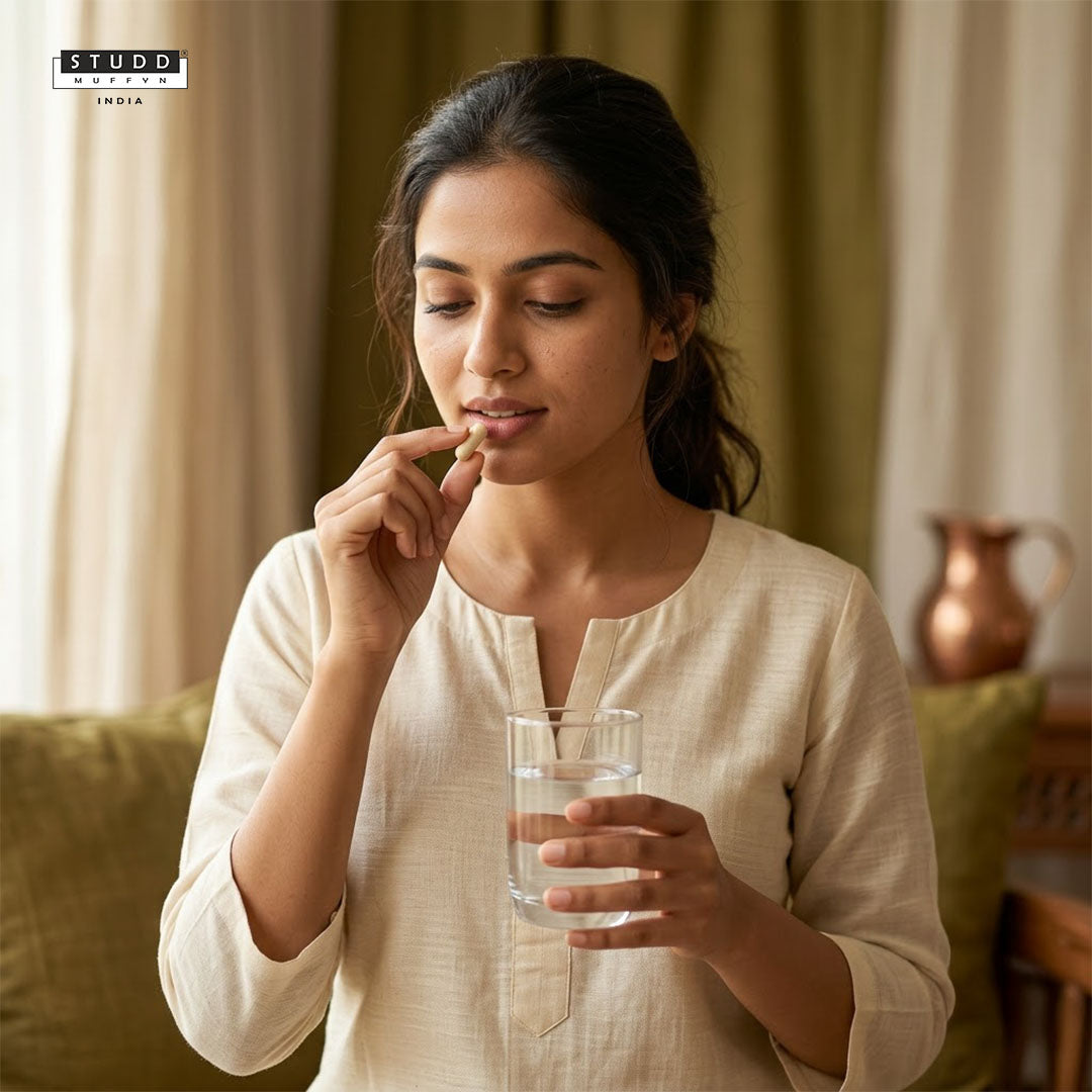 Woman taking Time Capsule anti-ageing supplement with a glass of water