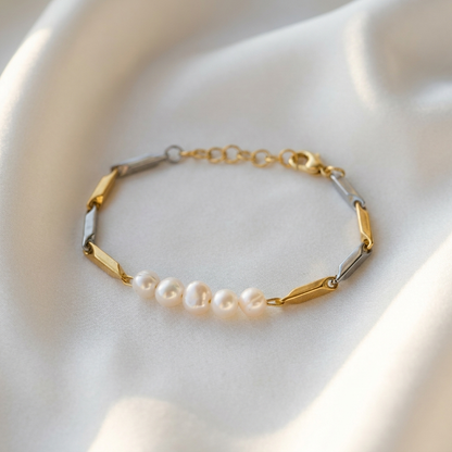 Alchemy Pearl Dual-Tone Rice Chain Bracelet with five white pearls and gold-silver rice links on white silk