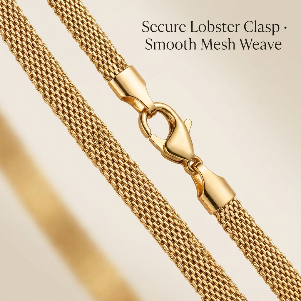 Macro close-up of the flat snake chain mesh weave and gold-tone lobster clasp