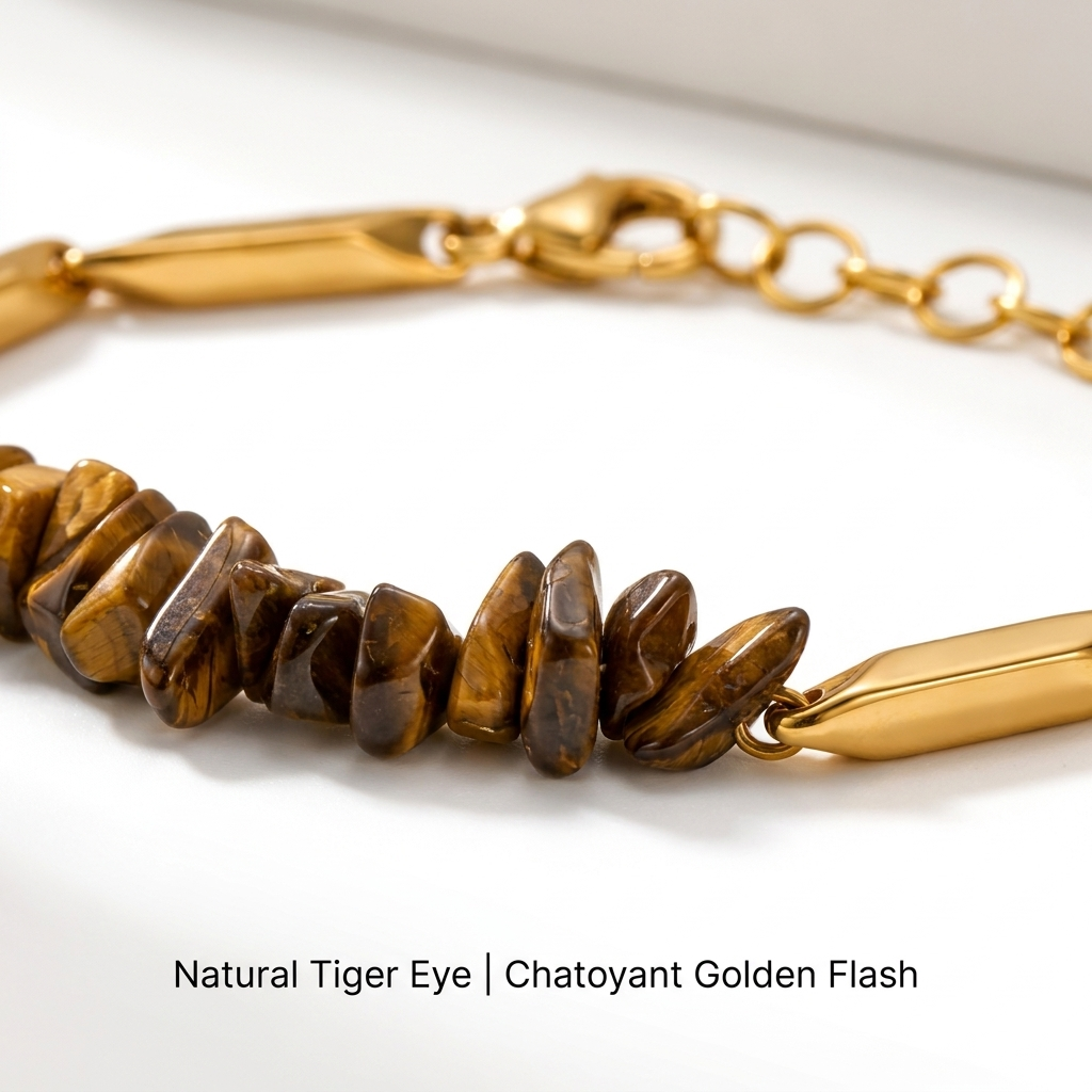 Macro close-up of natural Tiger Eye crystal chips and golden rice links showing chatoyant flashes