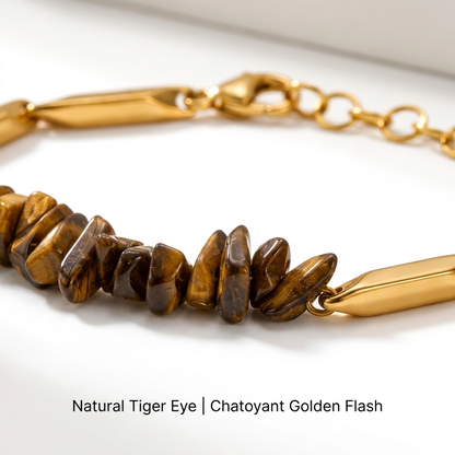 Macro close-up of natural Tiger Eye crystal chips and golden rice links showing chatoyant flashes