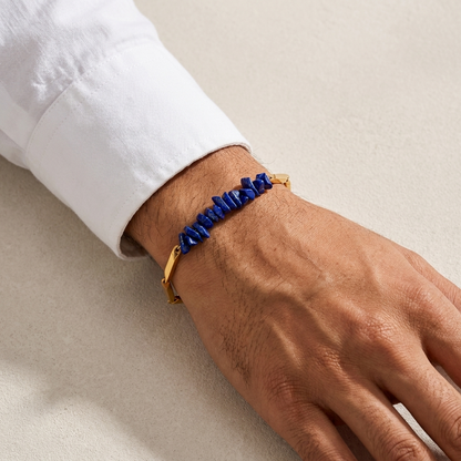 Man wearing the Lapis Lazuli golden rice chain bracelet with a formal outfit