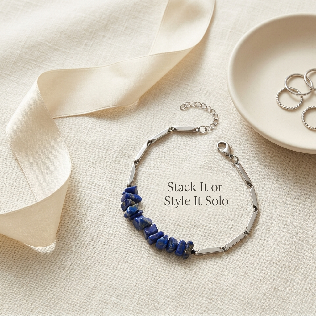 Lapis lazuli bracelet styled flat-lay with neutral accessories
