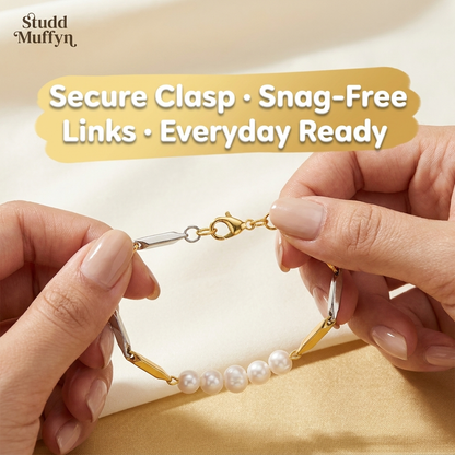 Bracelet clasp and chain held taut between fingers demonstrating secure hold and snag-free links